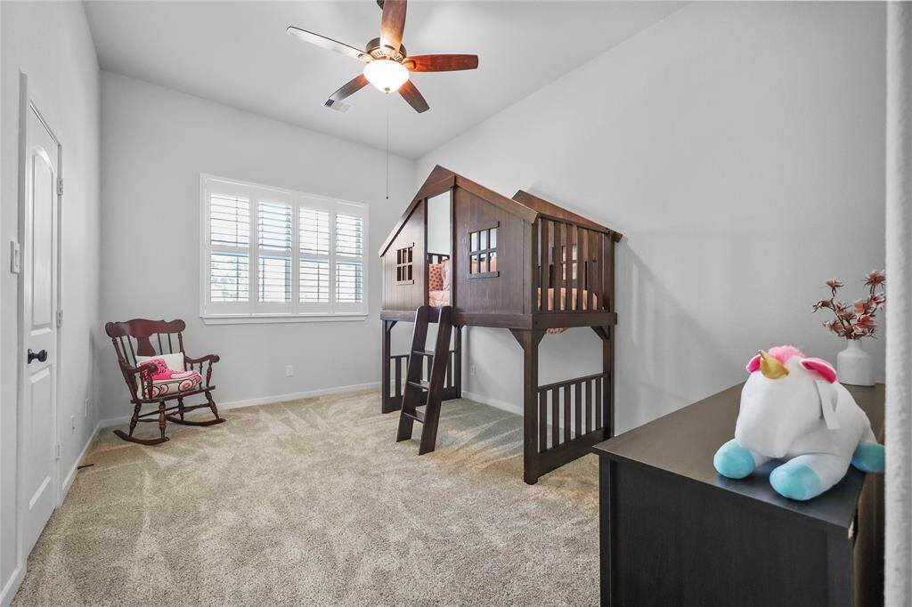 Bedroom 5 with a front-yard view. Every room upstairs is a great size!