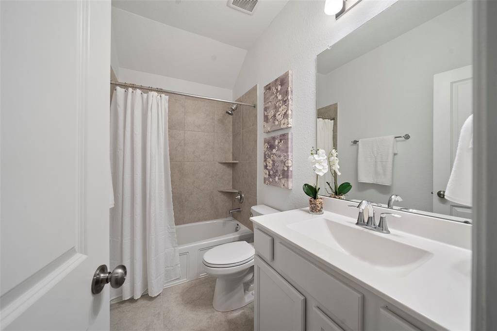 This beautiful third bathroom is ideal for the upstairs bedrooms.