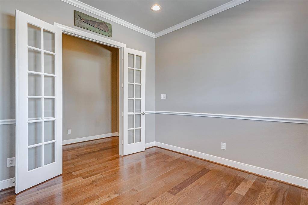 The office space includes french doors for privacy while work at home.