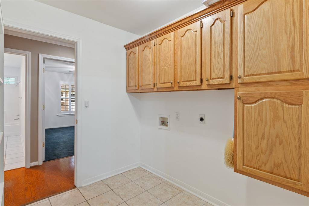 Large Laundry/Mud room at Garage Entry.