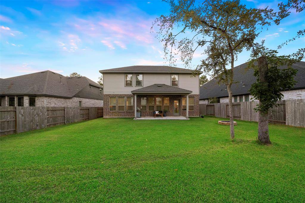 An impressive view of the yard offering endless possibilities for creating your ideal outdoor retreat.