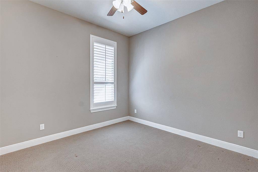 Large secondary bedrooms with upgraded  carpet and large walk in closets.