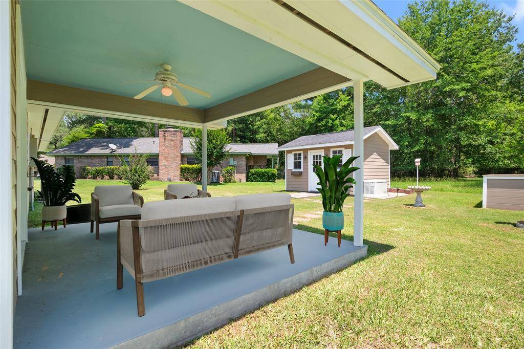 Virtually staged Covered Patio, plenty of room for seating or your patio table set.
