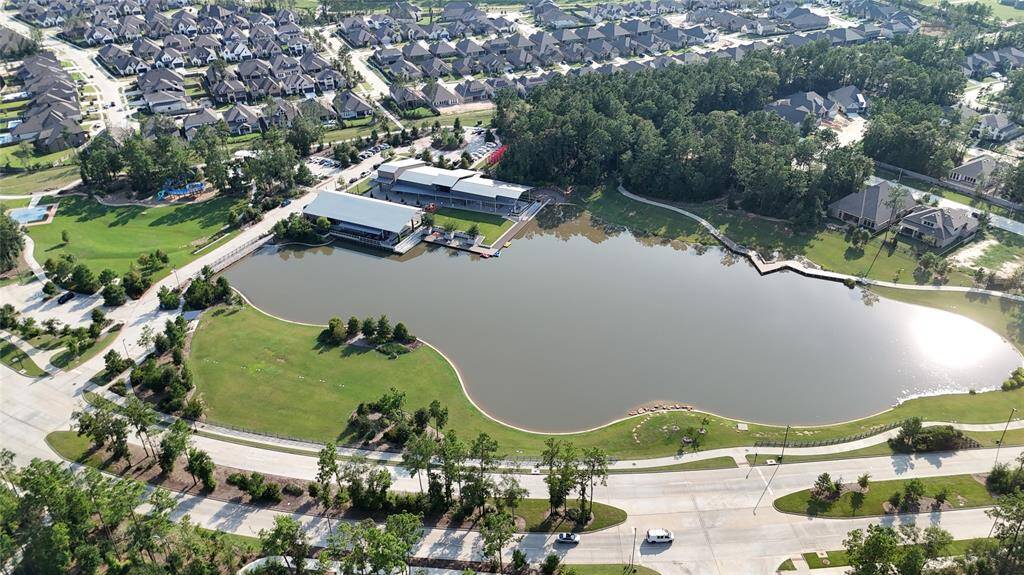 Artavia's amenities include a 5-Acre Lake with Paddle Boats, 24/7 Fitness Center, Palate Cafe, Playground, Fields, Trails, and Meditation Garden.