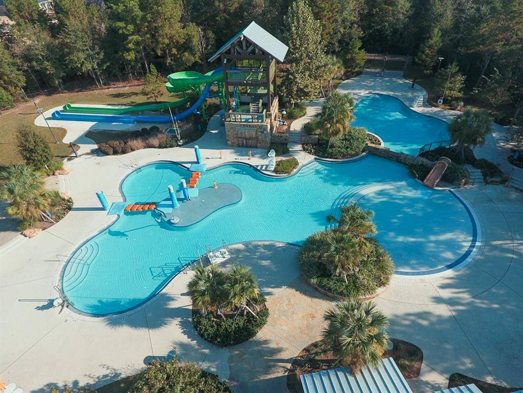 The recreation center includes a fitness pool with five lap lanes and an area for aerobic exercise. After your workout, relax on the sun deck. A winding pathway through the trees connects Forest Island's tennis courts, basketball court and swimming complex with the 3-acre Lily Pad Spray Park, nearly 20 acres of fun!