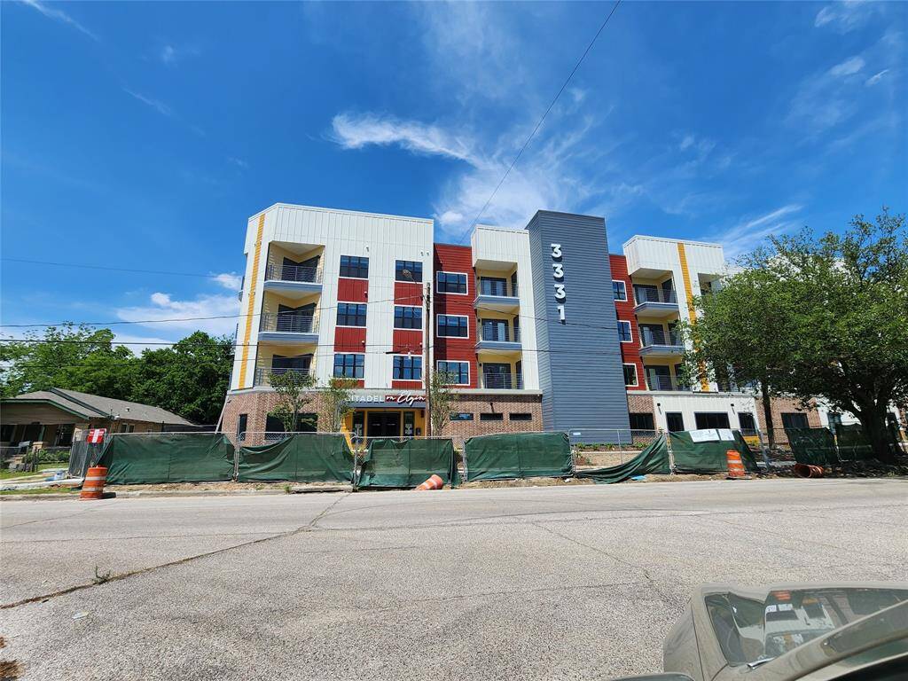 New construction of mixed use residential and commercial project in the next block