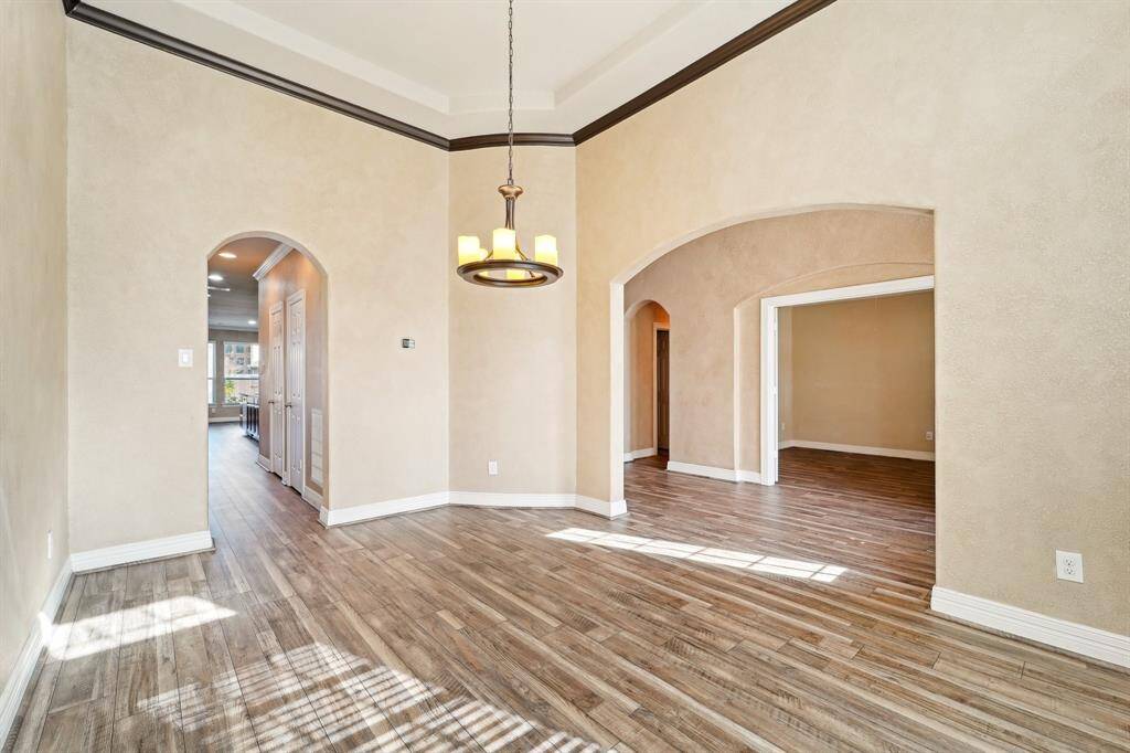 Spacious dining room leading into the butlers pantry
