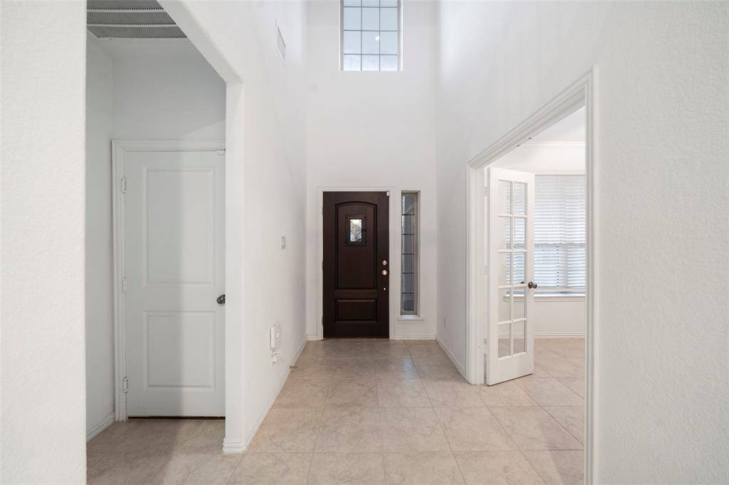 Extensive tile flooring throughout.