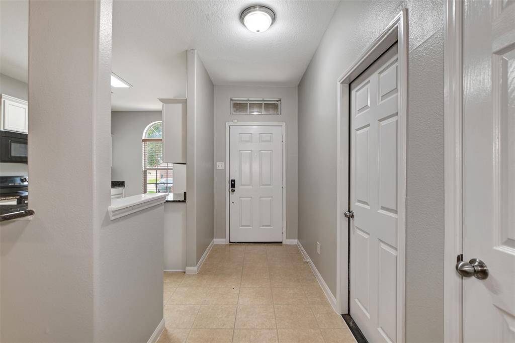 Looking towards front door from entry way