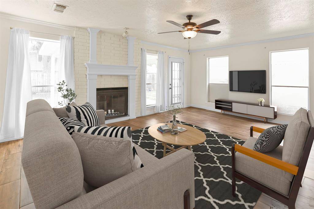 Living Room open to the kitchen. Virutally staged.