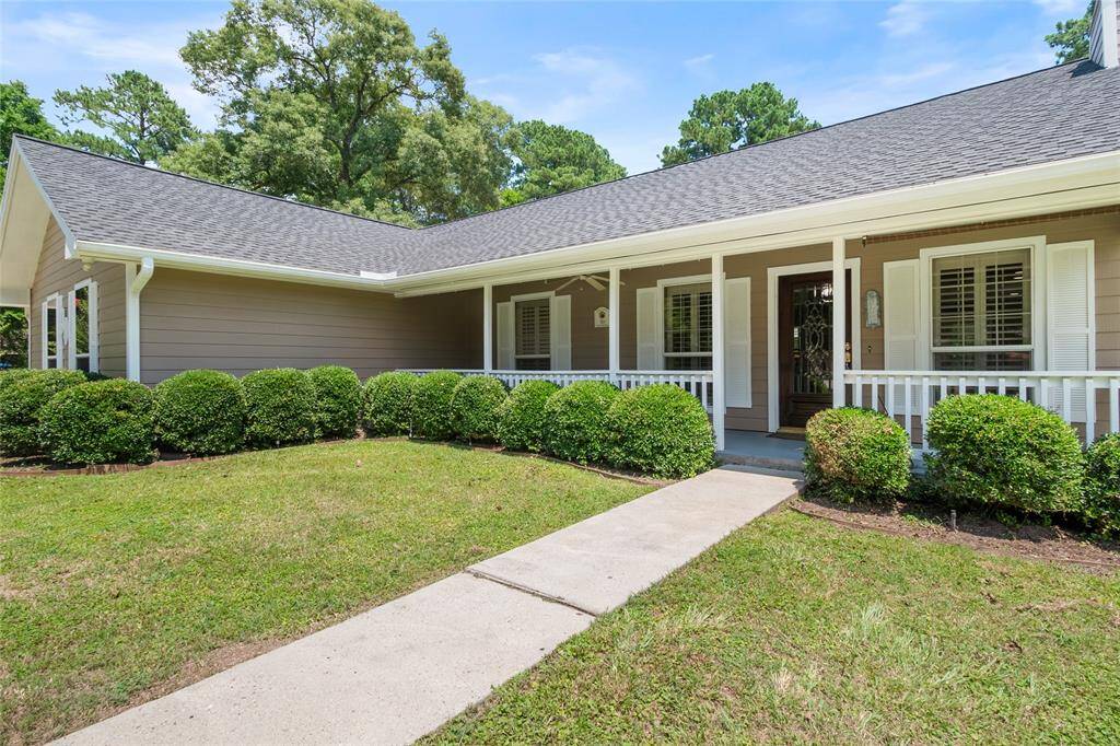 Covered Front porch just waiting for your rocking chairs.