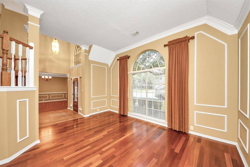 This is a great flex space - could be an office, formal living, downstairs entertainment area