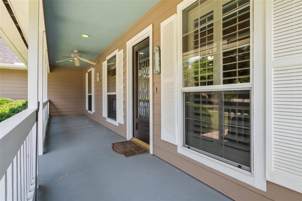 Beautiful and inviting Mahogany beveled glass front door.