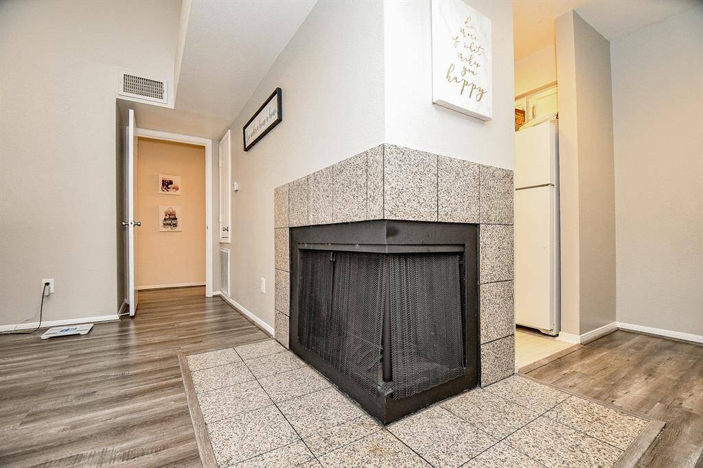 A view of the fireplace from living or dining area!