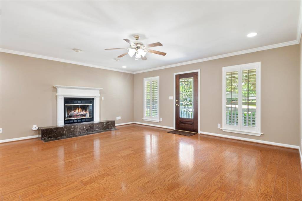 Upon Entry you will love the open design, gas log fireplace, lots of light and plantation shutters throughout the home.