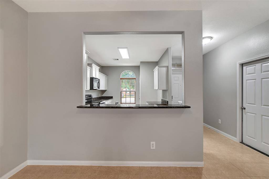 Pass-thru window and breakfast bar