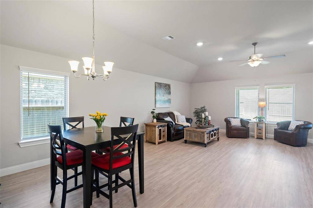 Plenty of natural lighting in the dining area and living room.