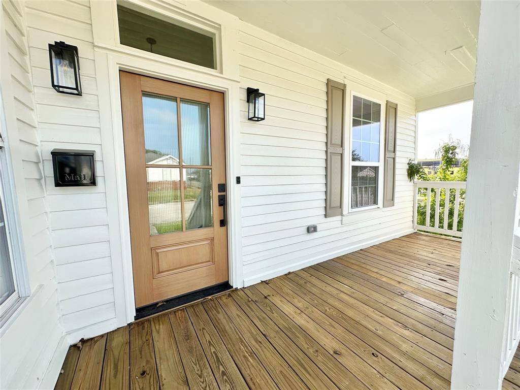 Beautiful porch for people watching or drinking your morning coffee.