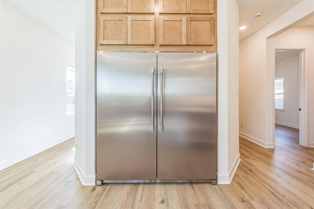 look at his industrial size refrigerator