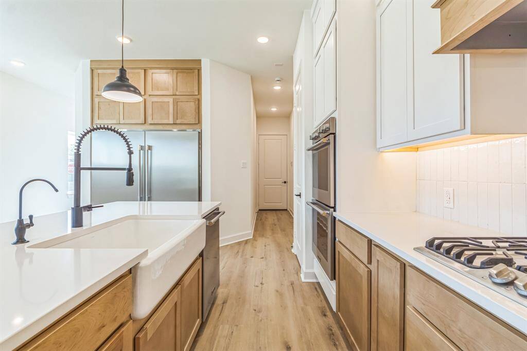 Large farmhouse sink, 5 burner stove and double ovens make this kitchen a pleasure to cook in