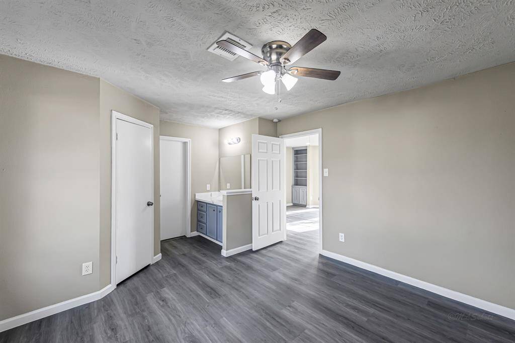 Secondary bedroom is connected to a gorgeous, full bathroom and has it's very own vanity area with sink for extra privacy & convenience!