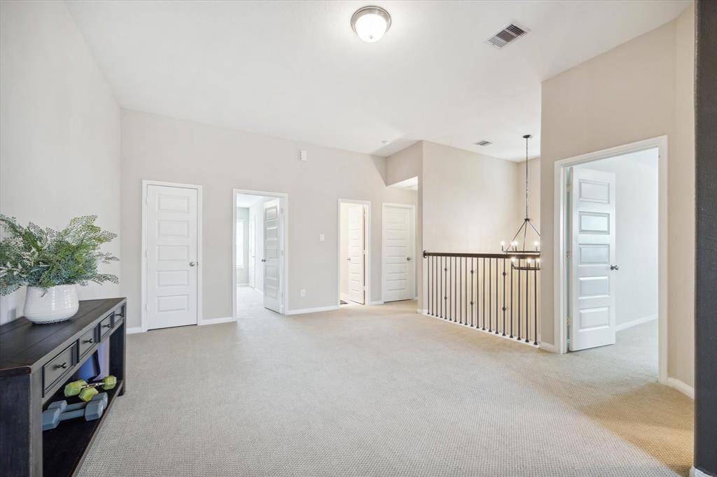 Large flex space, being used as a workout area currently