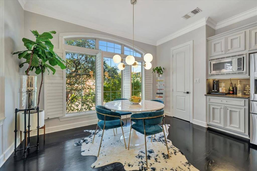 Throughout the home, plantation shutters add a touch of elegance and timeless style, offering both privacy and the ability to control natural light with ease.