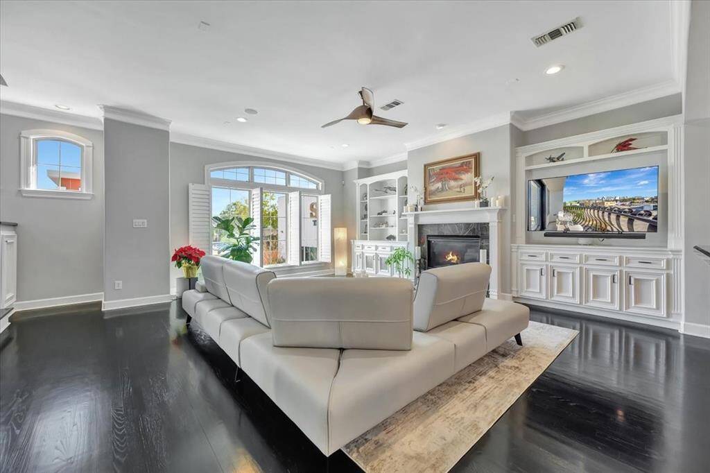 Another view of the family room offering spacious living area and lots of natural light and added recessed lights.