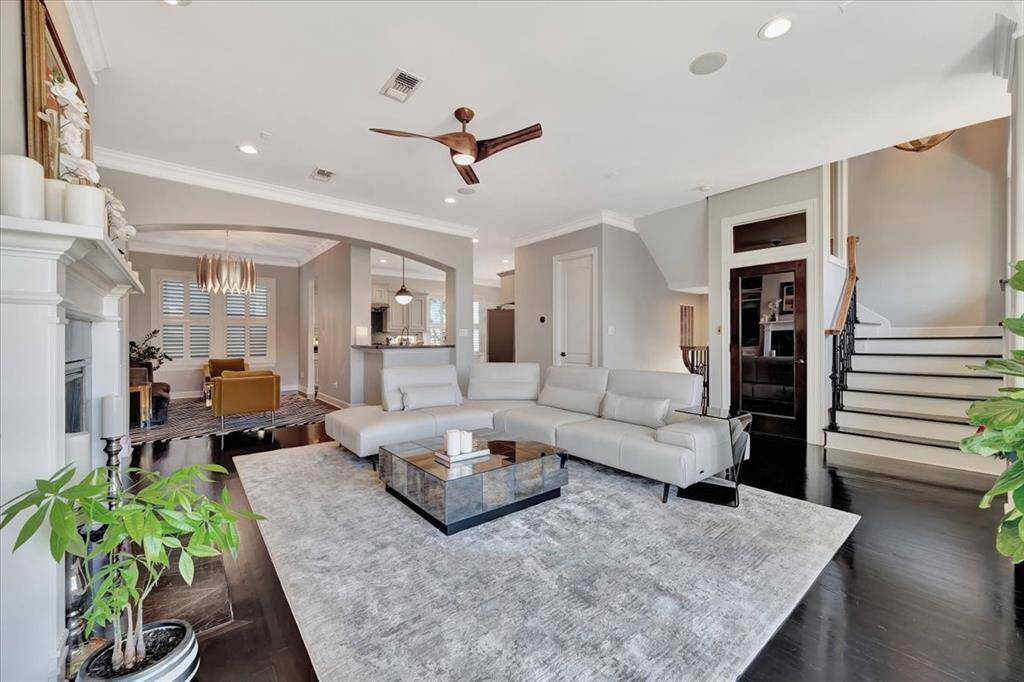 The open floor plan creates a seamless flow, offering ample space for entertaining and gathering with ease.