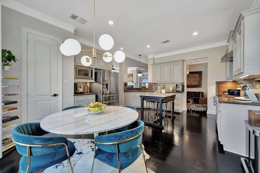 In this amazing kitchen there is no shortage of storage including a nice size walk-in pantry and a perfect coffee bar.