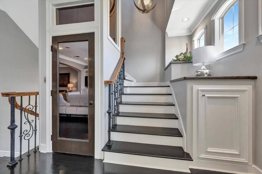 This picture highlights the convenient elevator, a wonderful feature for those who prefer not to take the stairs, providing easy access to all levels of the home.