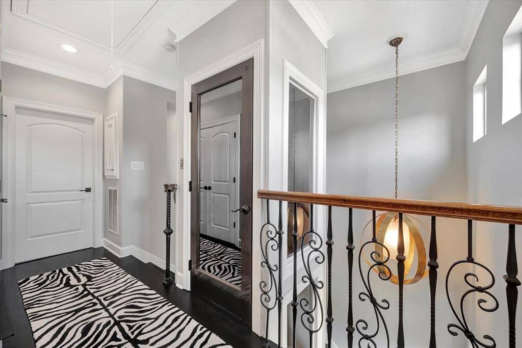 The third floor features an interior laundry located off of the primary suite.