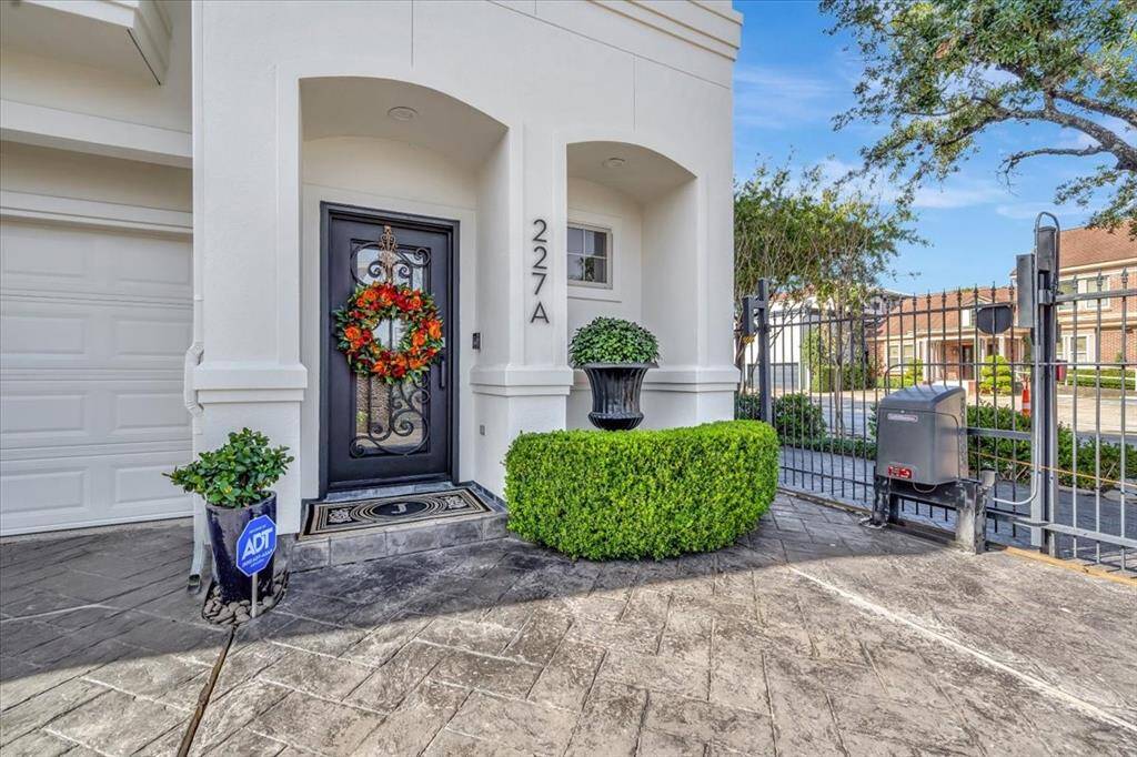 A beautiful iron front door and recent exterior paint enhance the beauty of this one of a kind home. Smart Home Integration: Includes smart Rainbird sprinkler system and smart locks for front and back doors.