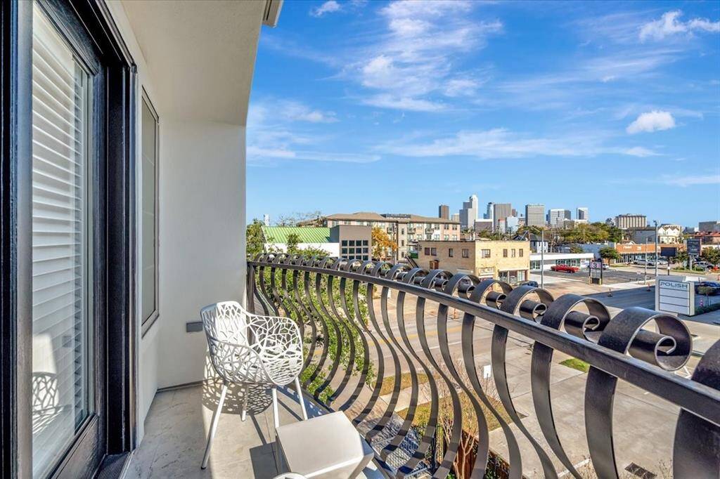 The upstairs balcony offers stunning views and a refreshing breeze, providing the perfect spot to relax and enjoy the outdoors.