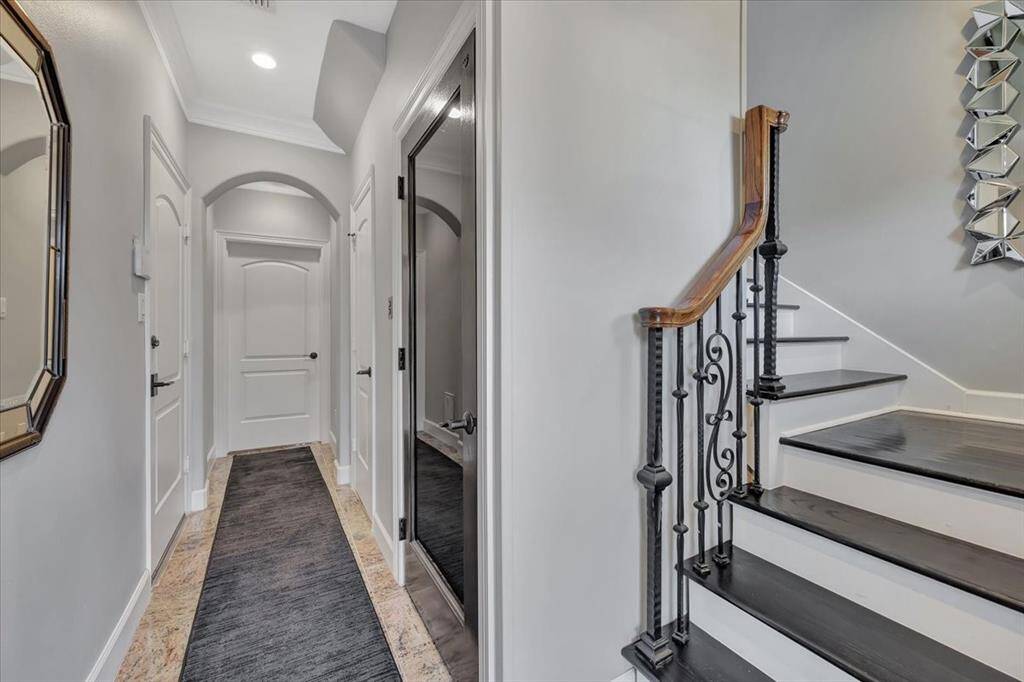 Upon entry there is a large storage closet, garage access and a spacious secondary bedroom with a full bath.