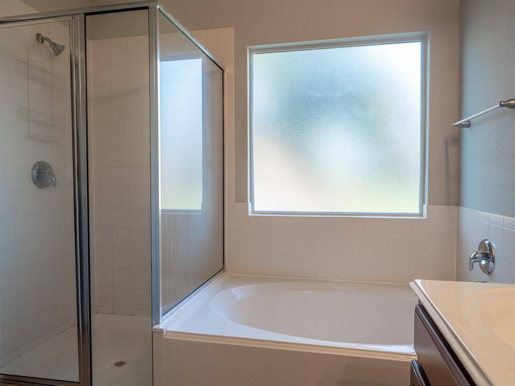 Soaking tub with separate shower