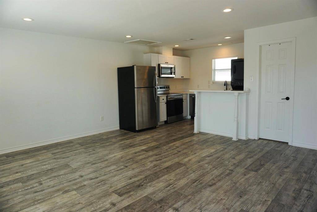 LIVING ROOM AND KITCHEN