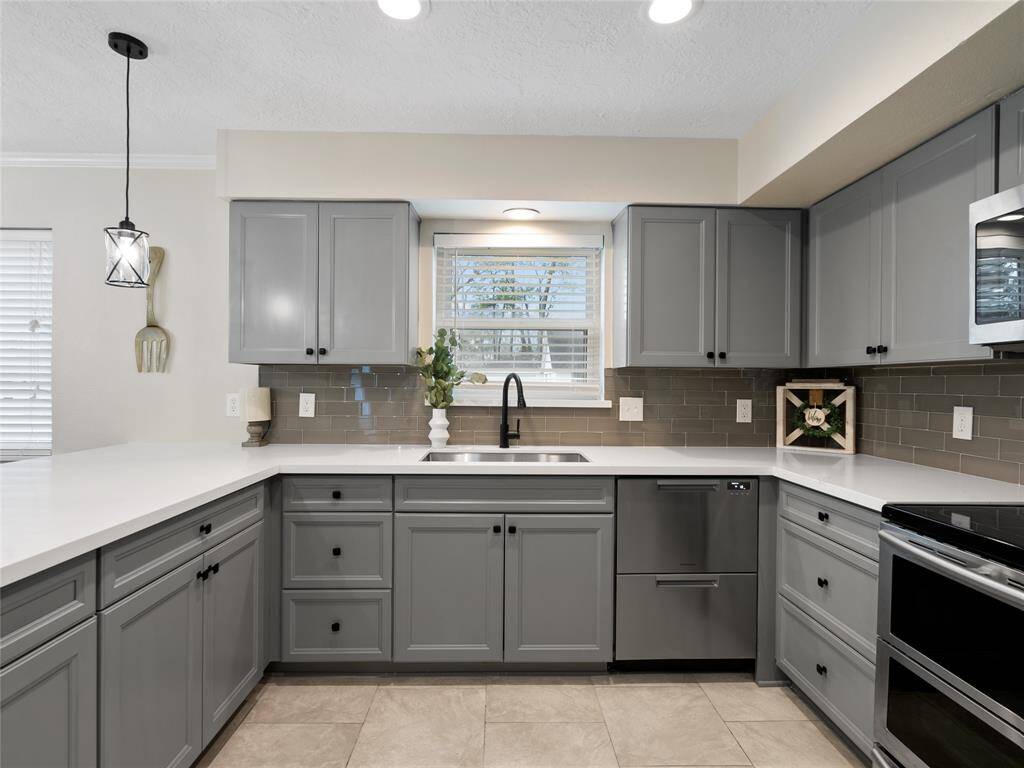 A home chef's heaven with ample counterspace & cabinets for storage