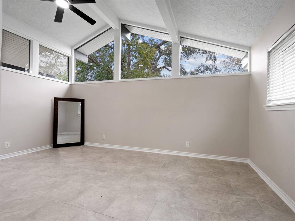 The natural lighting in the primary bedroom is unparalleled