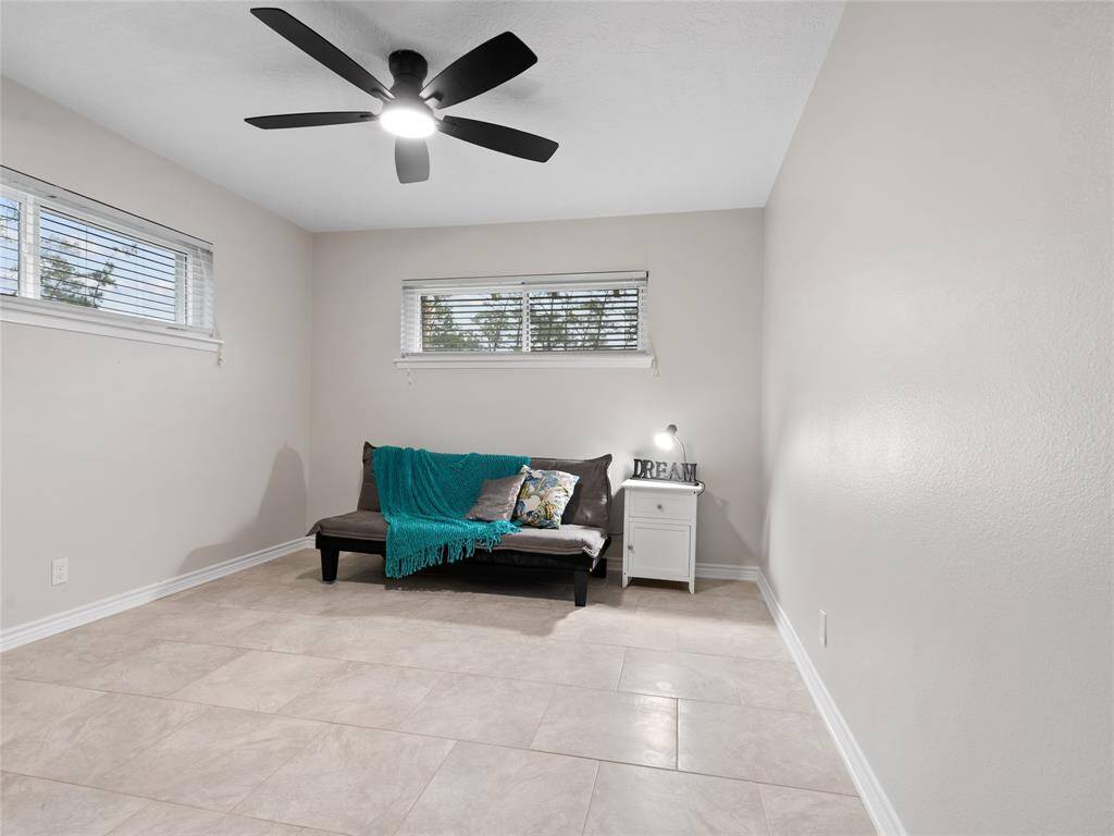The secondary bedroom on the first floor would be a great spot a nursery or guest bedroom