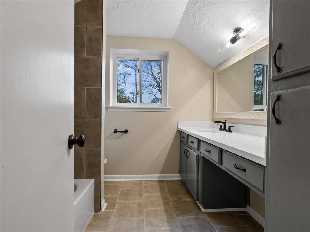 The full bath upstairs to be shared by the three additional upstairs bedrooms
