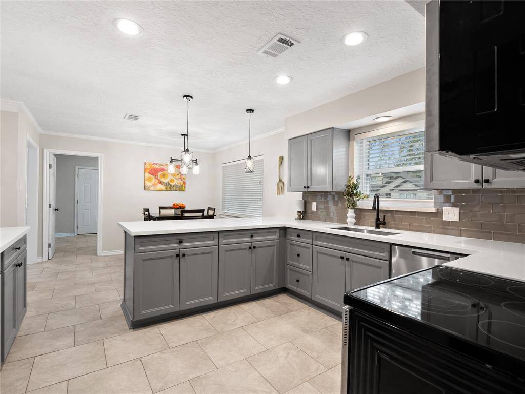 A view of the kitchen with the attached eating area