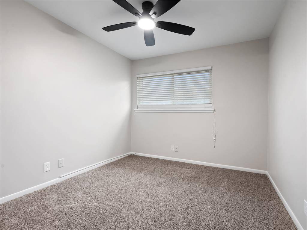 Another of the three upstairs secondary bedrooms