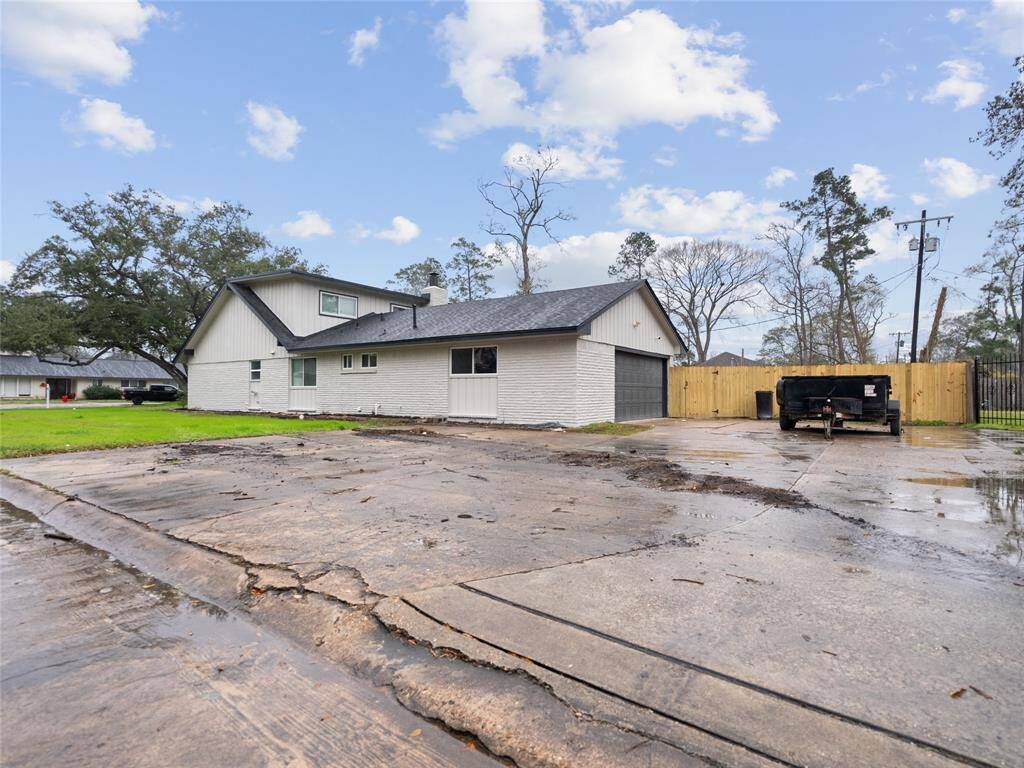 The entry for two-car attached garage is from the rear of the home