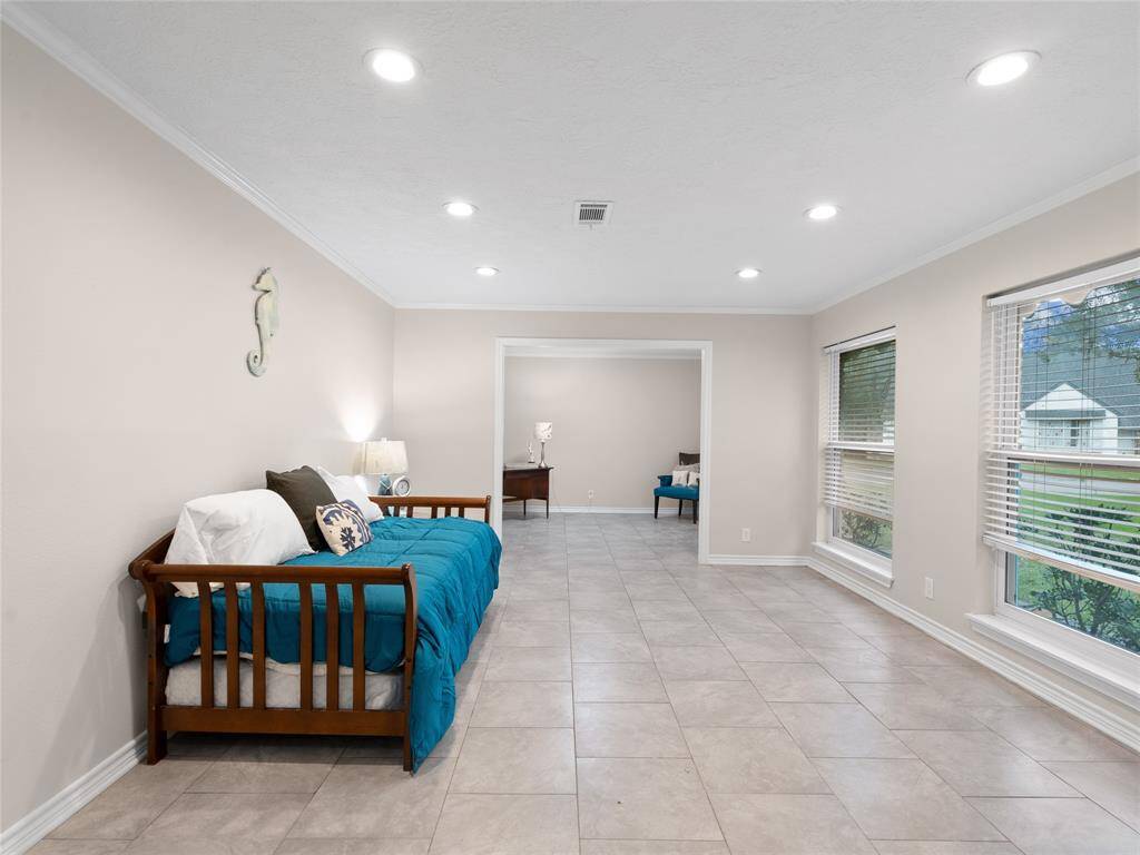 The living room is connected to the home office
