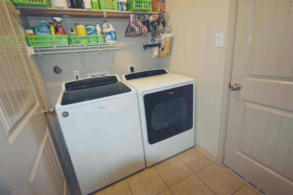 Washer/Dryer room off of the kitchen.
