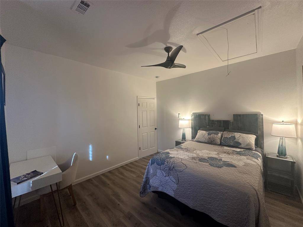 Come and unwind after a long day in this magnificent bedroom! This spacious room features gorgeous flooring, warm paint, high ceilings and ceiling fan.