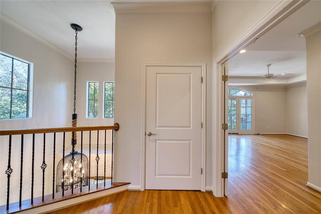 Inviting entry to the spacious primary bedroom on the second floor.