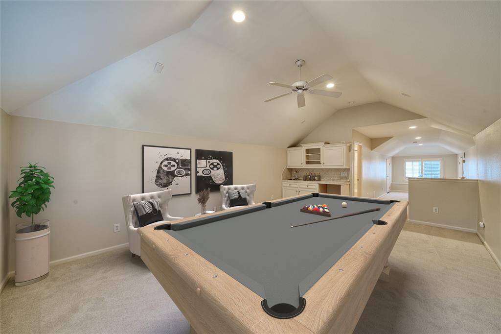 Features wet bar with space for a mini fridge. Explore endless possibilities with this third-floor flex space, perfect for a home office, gym, or entertainment area.