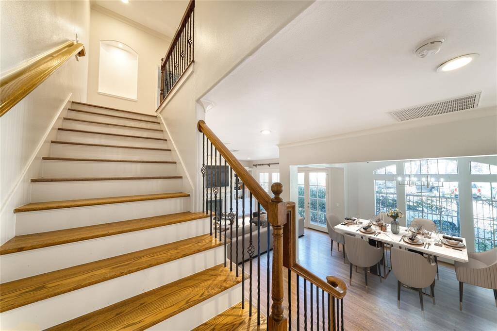 Elegant hardwood stairs ascending to the second floor.